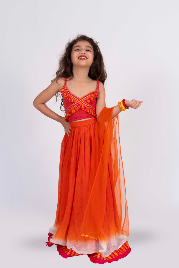 Twisha Girls Strppy Crisscrossed  Frilled Top With Lehenga Set - Orange & Pink